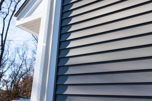 siding repair being done on a home