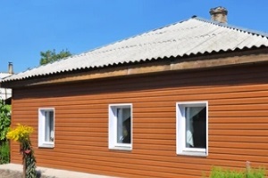 asbestos siding on orange house