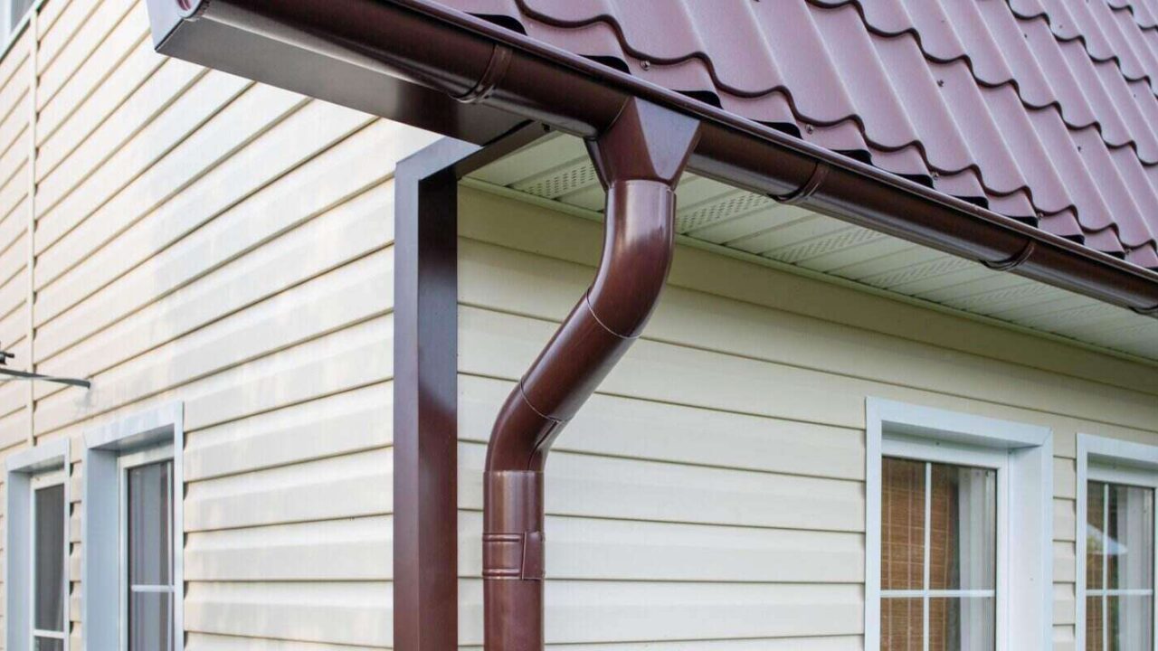 small house covered with siding new roof