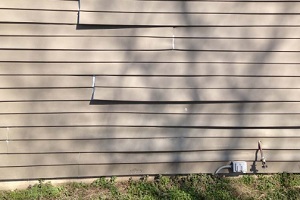 wraped and damaged vinyl siding