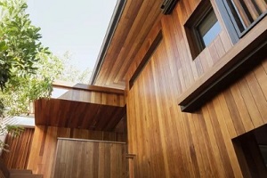 beautiful home with wood siding